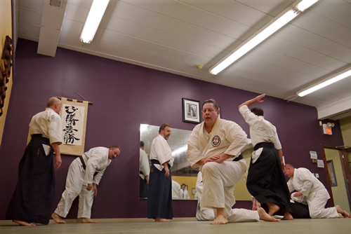 Hugh gets up slowly after a long morning